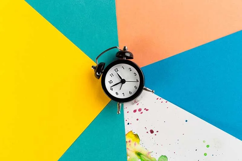 Painter rolling fresh paint onto an interior room wall
