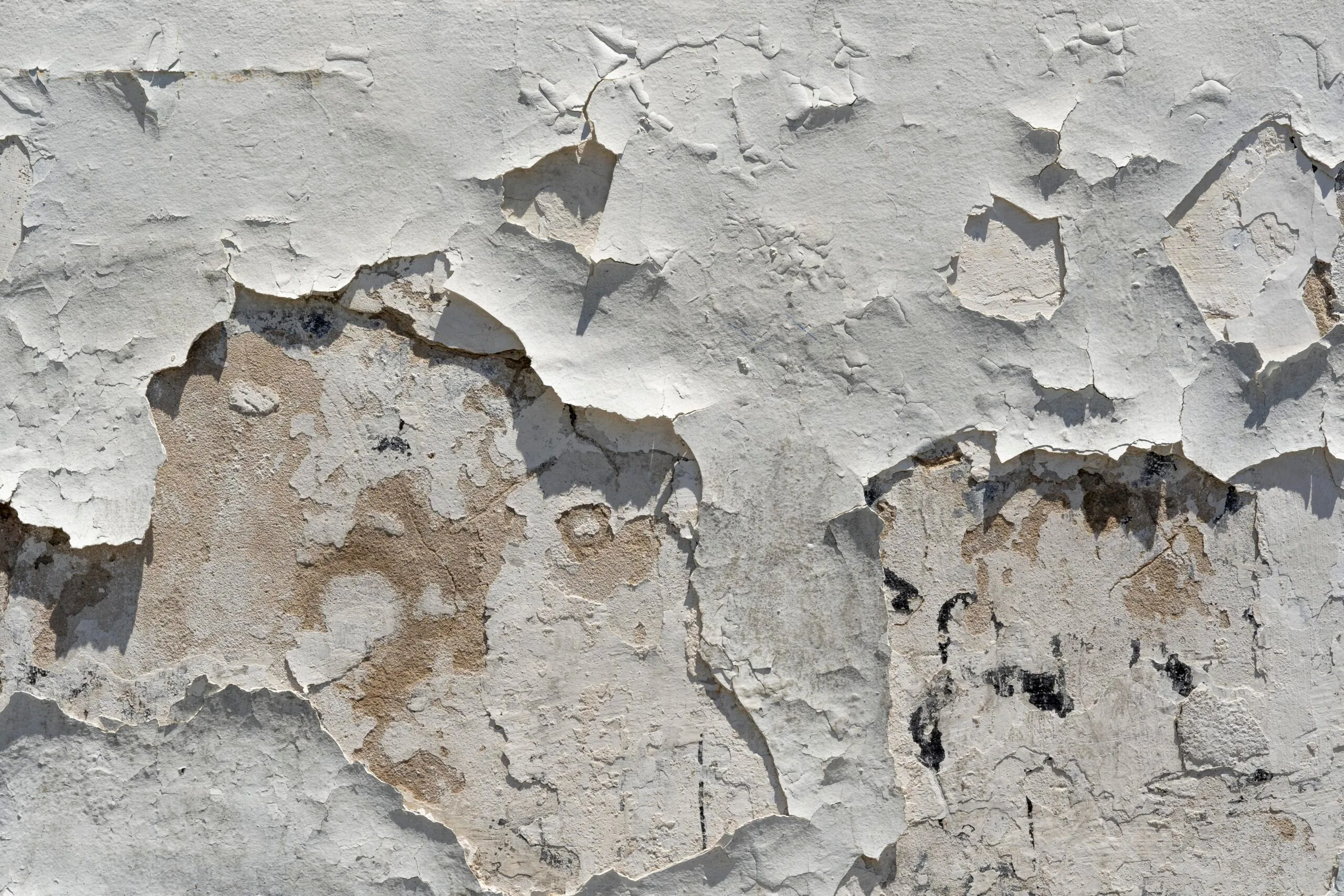 Old wall with falling paint